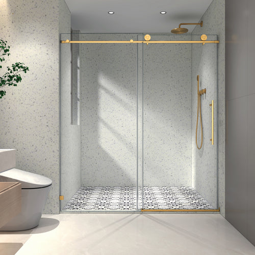 Brushed gold frameless sliding shower door with soft-close hardware — image 1