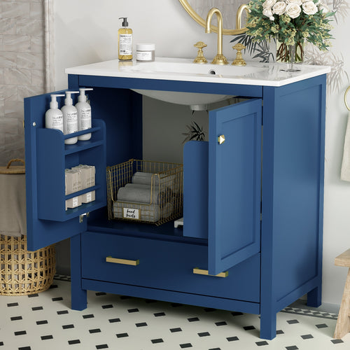 Blue bathroom vanity with white ceramic sink and soft-close doors — image 4