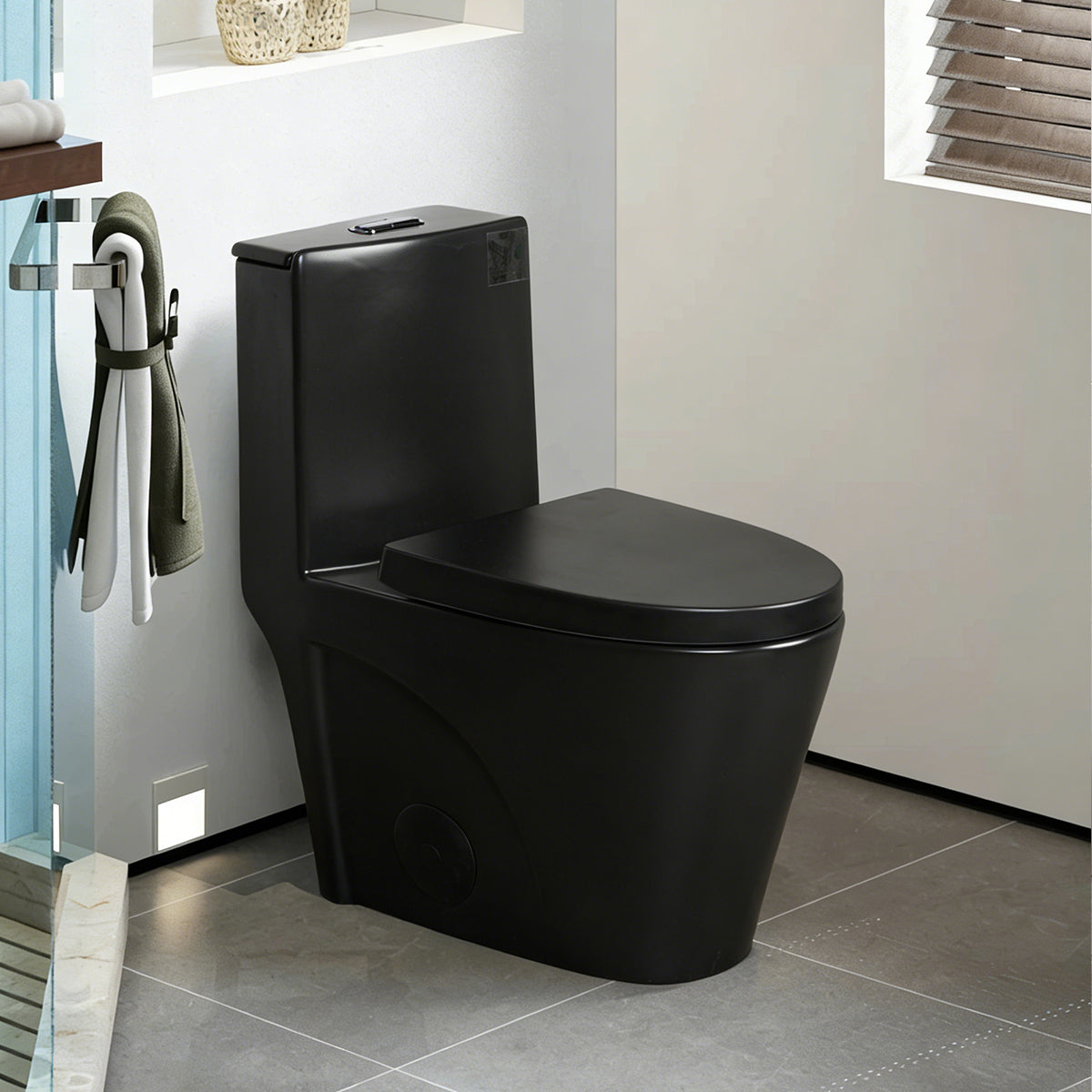 KZG one-piece black ceramic toilet with elongated comfort height bowl and soft-closing seat — image 1